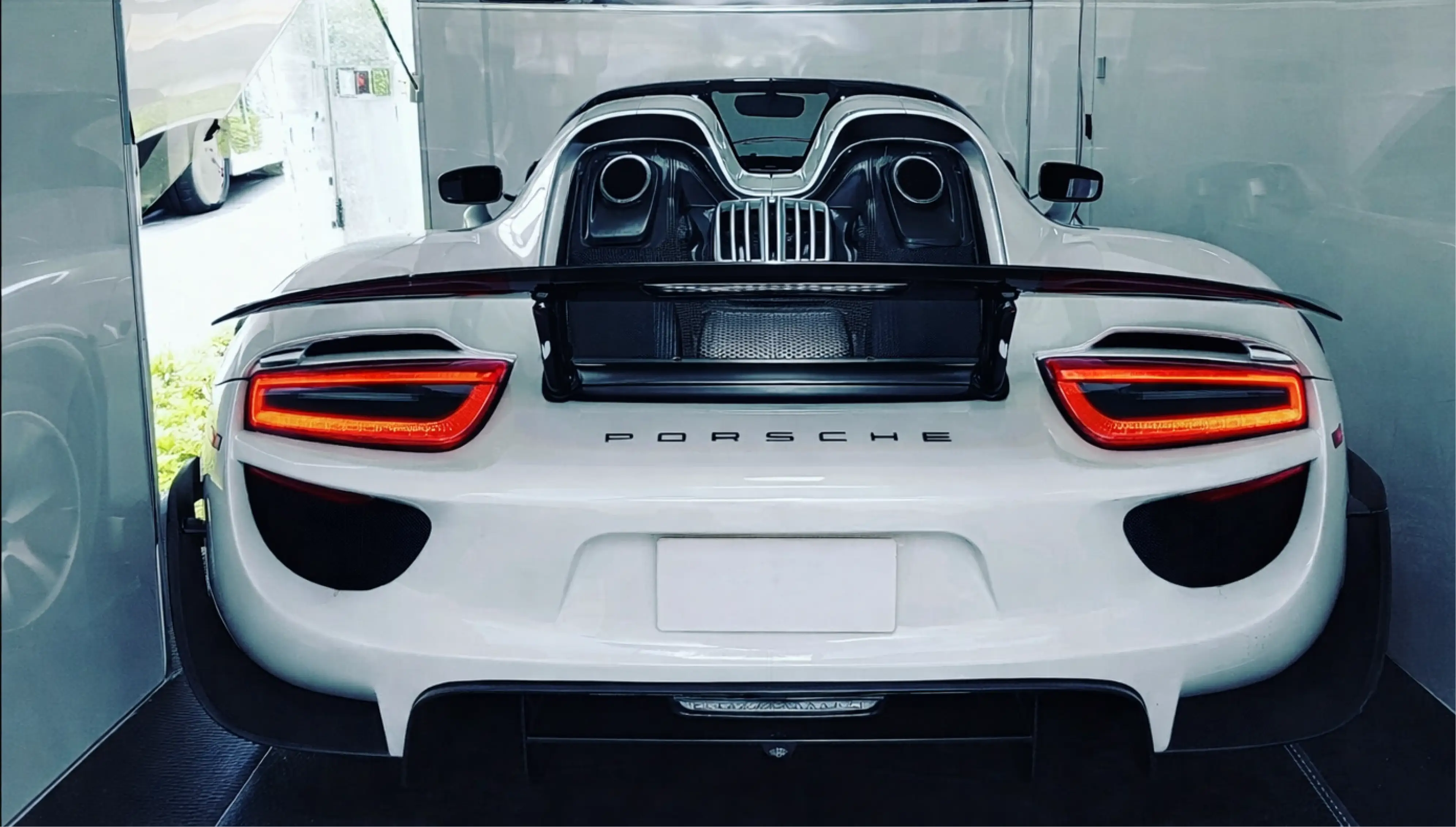 What is luxury car transport — enclosed trailer loading